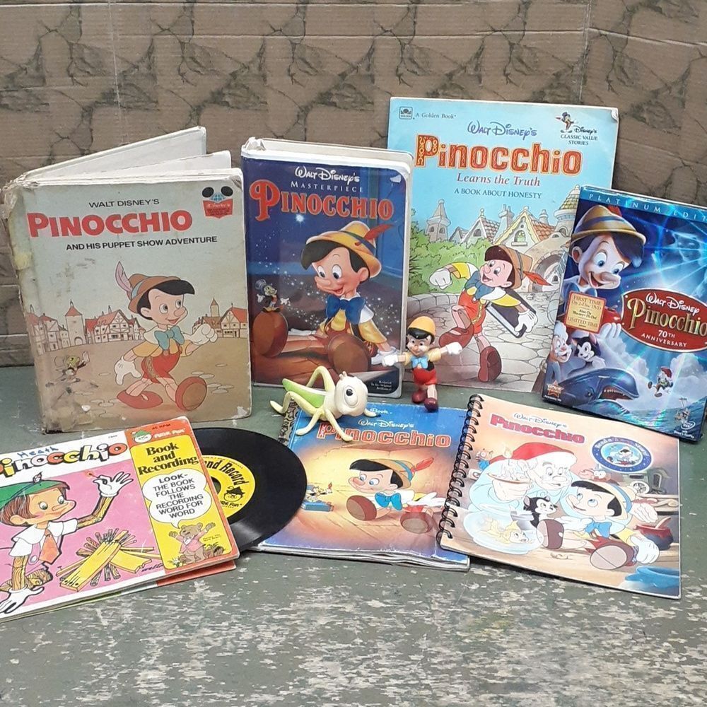 Disney Pinocchio bundle, 45 record, Jiminy & pinocchio figures, VHS‎ &dvd, books